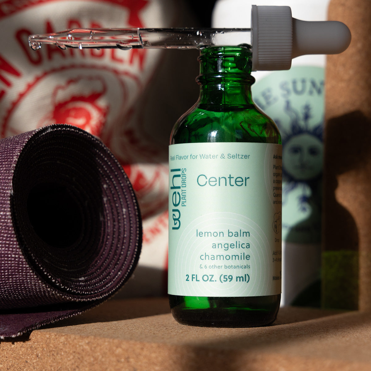 Center Plant Drops flavor - Lemon Balm, Angelica and Chamomile - with yoga mat and water bottle